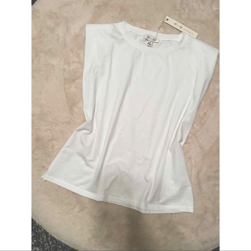 White shoulder pad tee